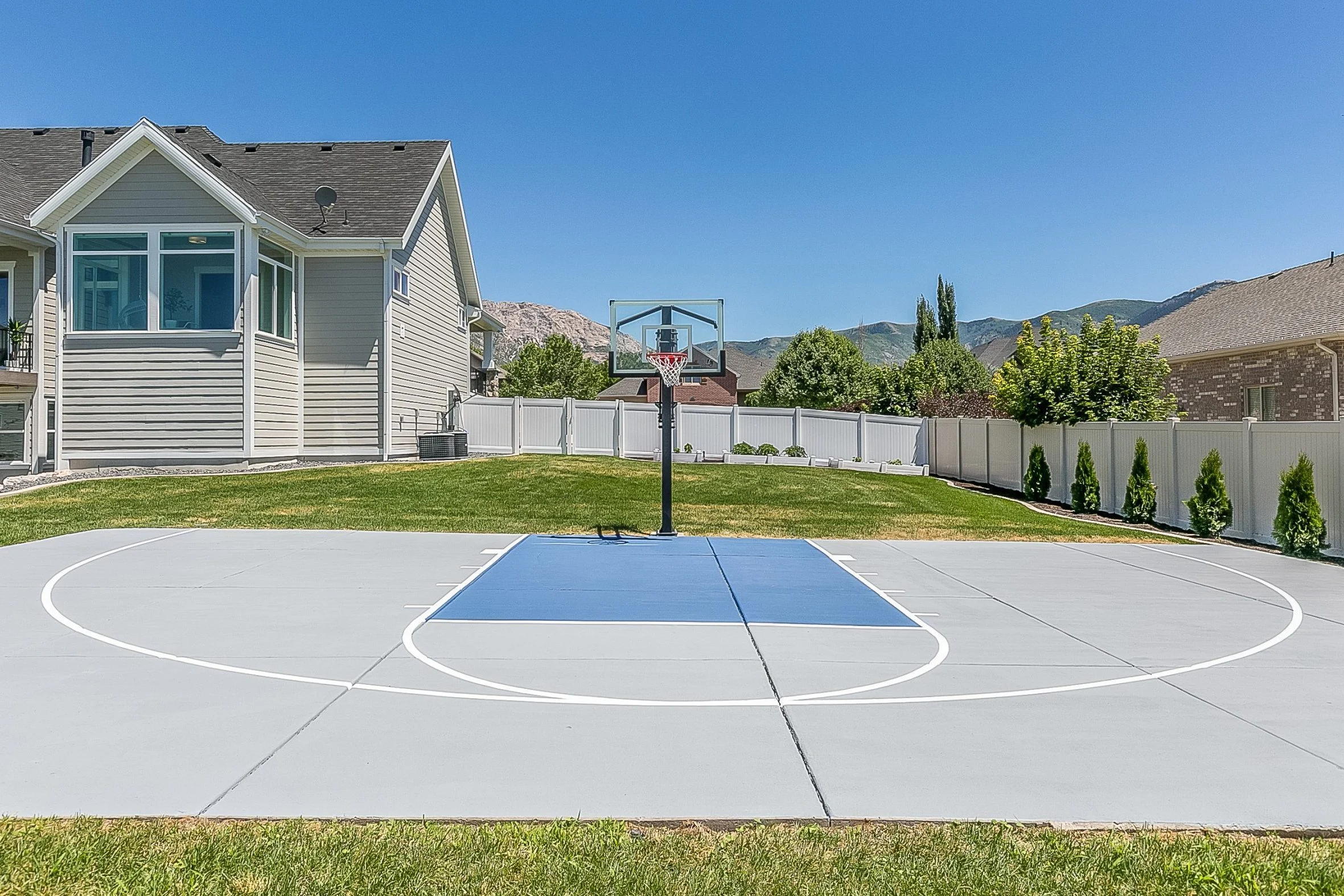 A backyard basketball court